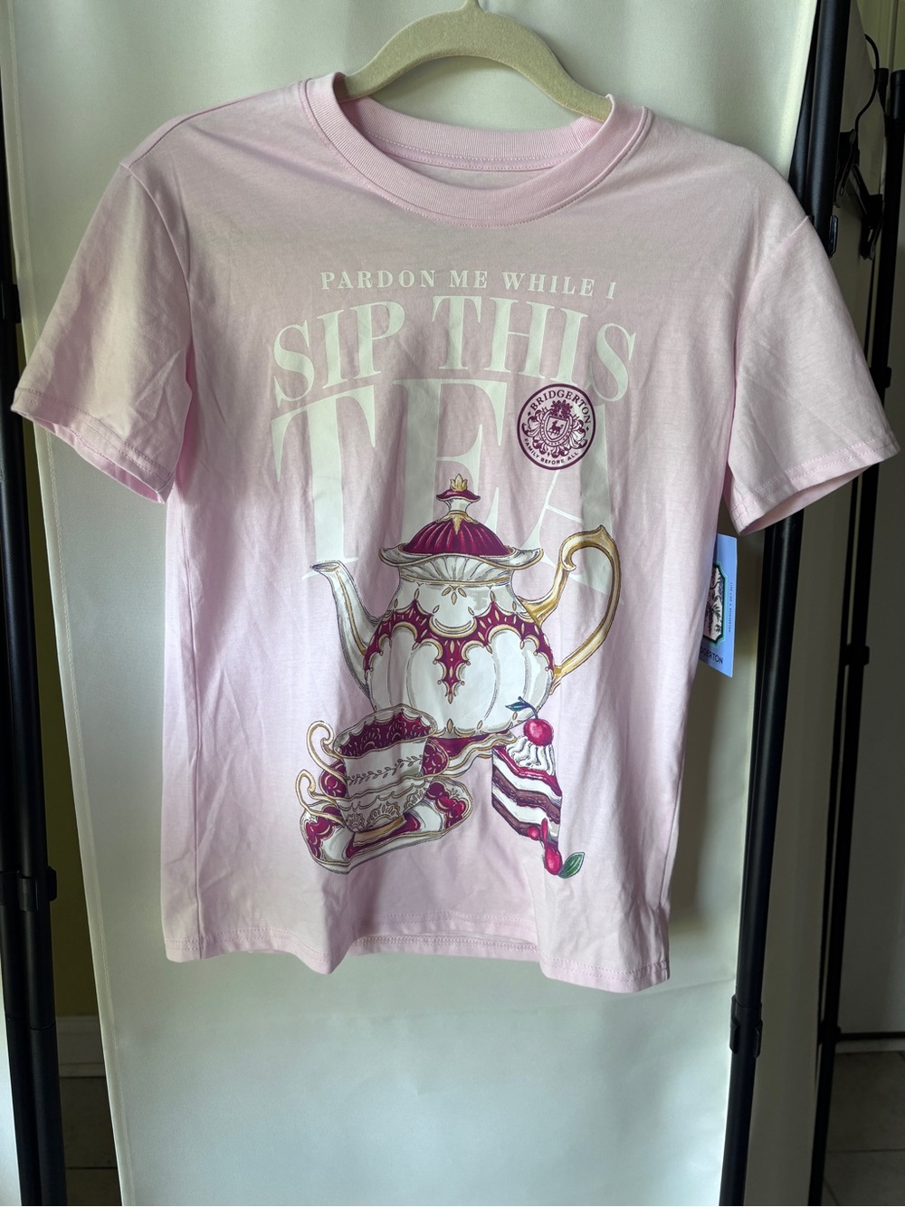 Bridgerton NWT Pardon Me While I Sip This Tea Graphic Short Sleeve Tee - Pink